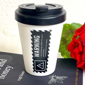 Typo coffee Cup with central perk slogan